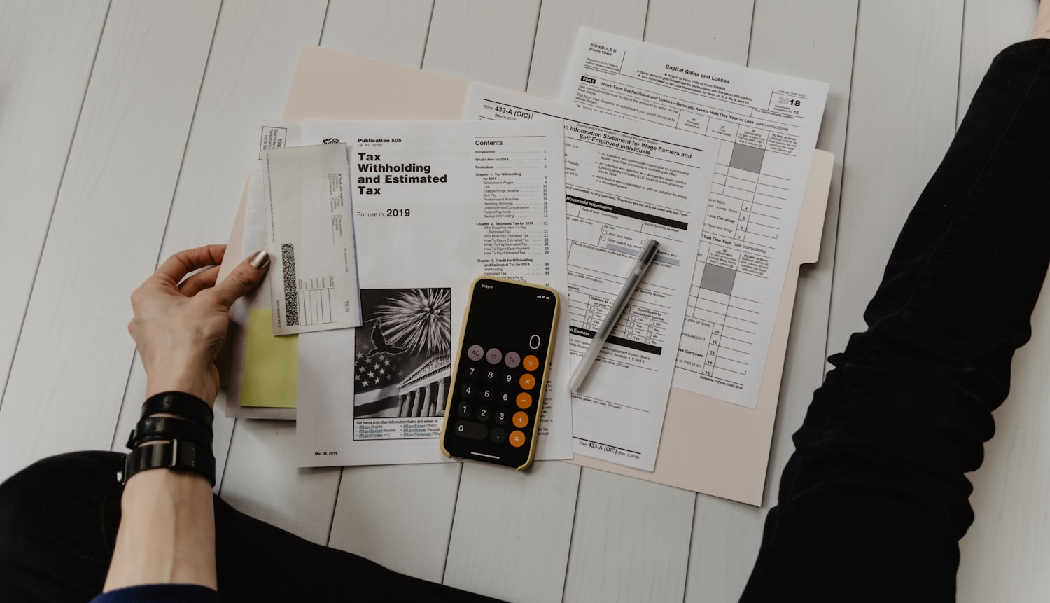 Tax documents and planning on a desk